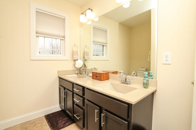 bathroom with vanity and tile patterned flooring