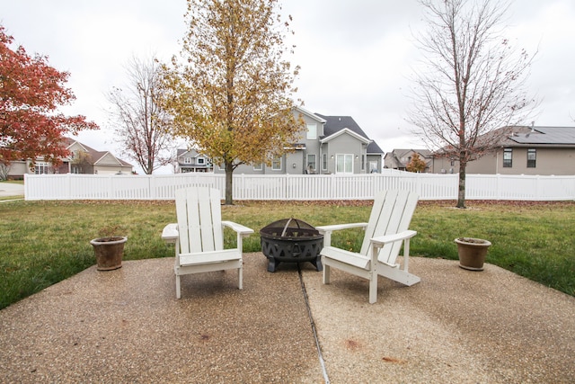 view of patio / terrace with a fire pit