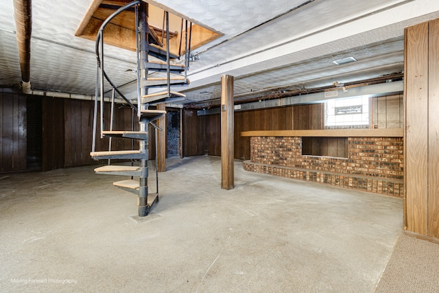 basement with wooden walls