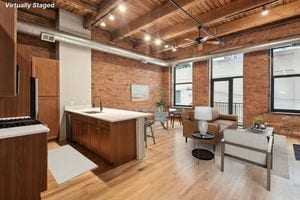 interior space with wood ceiling, rail lighting, ceiling fan, beamed ceiling, and light hardwood / wood-style flooring