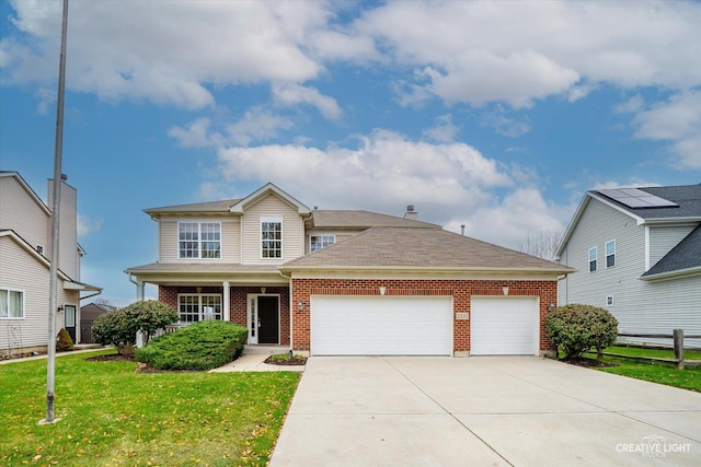 front of property with a garage and a front lawn