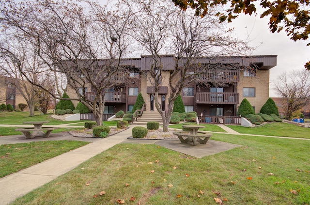 view of community with a yard