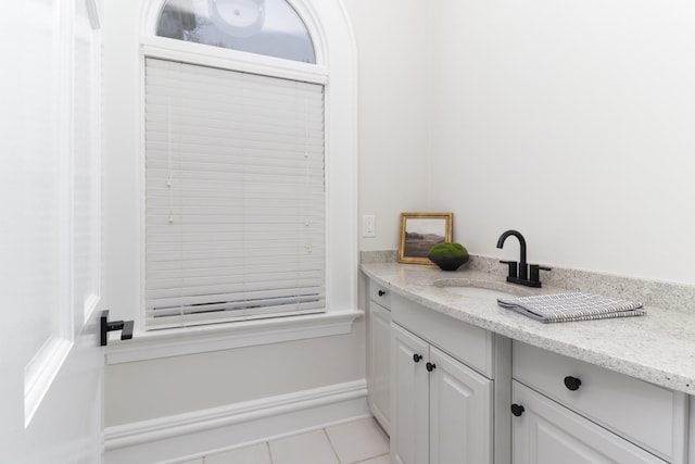 bathroom with vanity and tile patterned floors