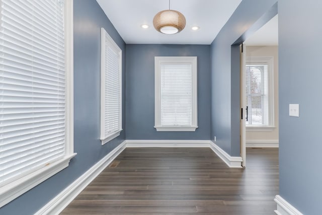 empty room featuring dark hardwood / wood-style floors