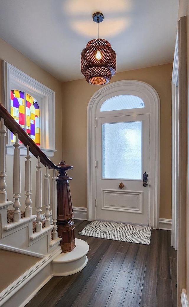 foyer featuring dark wood-type flooring