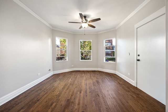 empty room with dark hardwood / wood-style floors, ceiling fan, and ornamental molding