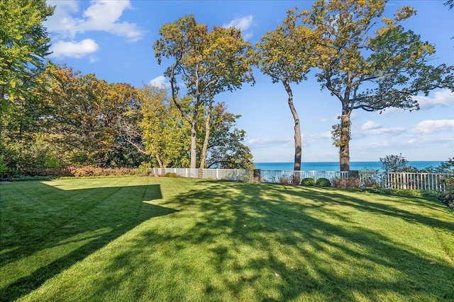 view of yard with a water view