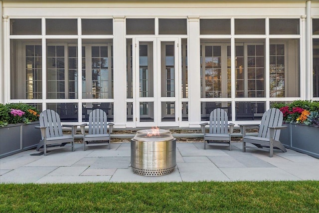 view of patio / terrace featuring a fire pit