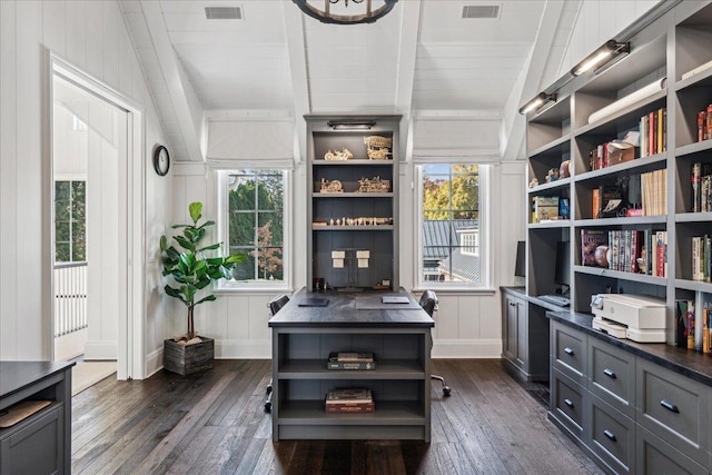 interior space featuring dark hardwood / wood-style floors and lofted ceiling with beams