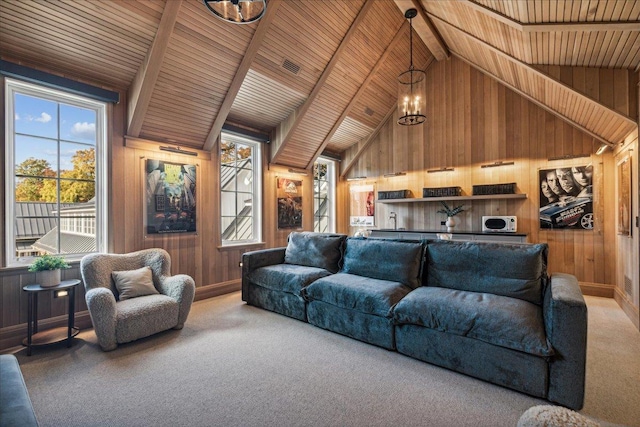 living room featuring wooden walls, wooden ceiling, beamed ceiling, and carpet flooring