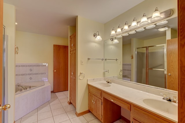 bathroom with vanity, shower with separate bathtub, and tile patterned floors