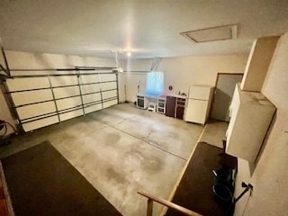 garage with white refrigerator