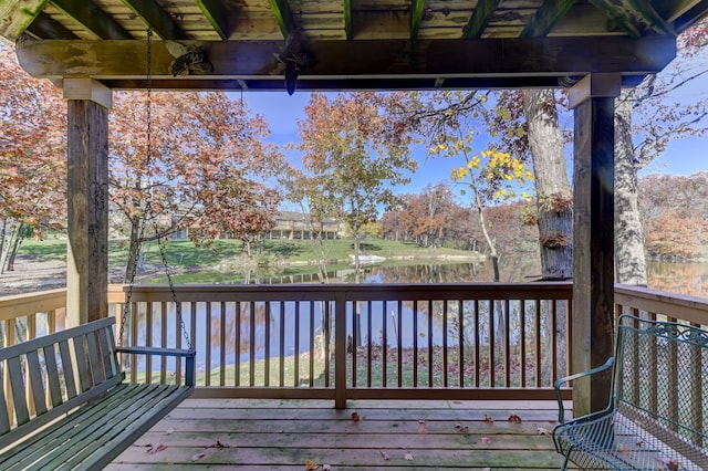 deck featuring a water view