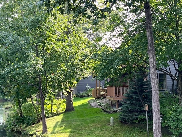 view of yard with a deck