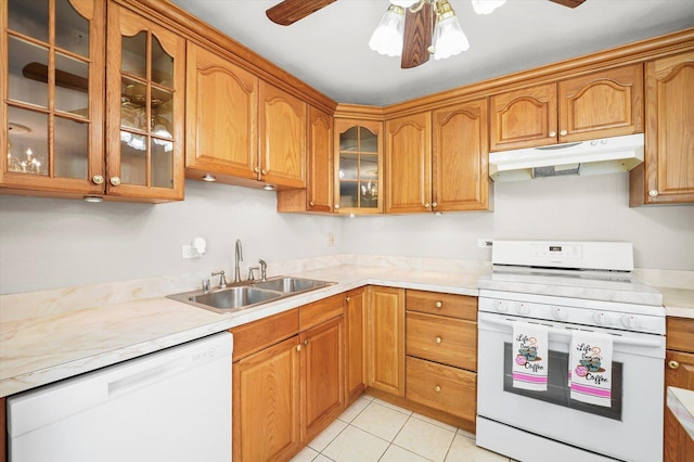 kitchen featuring ceiling fan, white appliances, sink, and light tile patterned floors