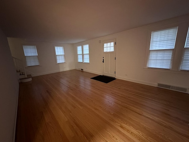 8646 S Nagle Ave, Burbank, IL 60459 - entryway with baseboards, visible vents, and wood finished floors