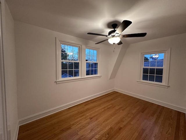 8646 S Nagle Ave, Burbank, IL 60459 - empty room featuring baseboards, a ceiling fan, and wood finished floors