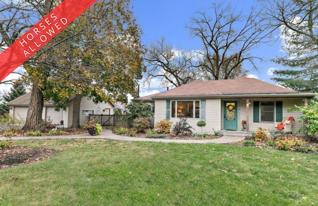 view of front of property with a front lawn