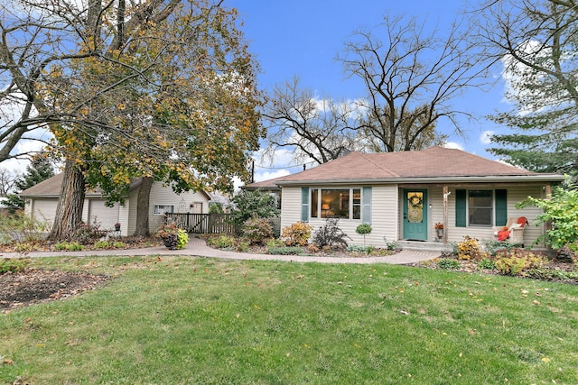 single story home with a front lawn