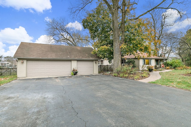 ranch-style house with a garage