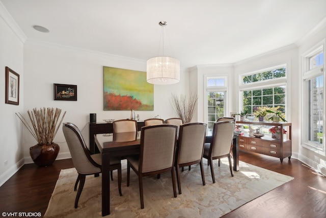 dining space featuring crown molding, a healthy amount of sunlight, a notable chandelier, and dark wood-type flooring