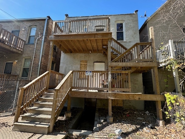 rear view of house with a deck