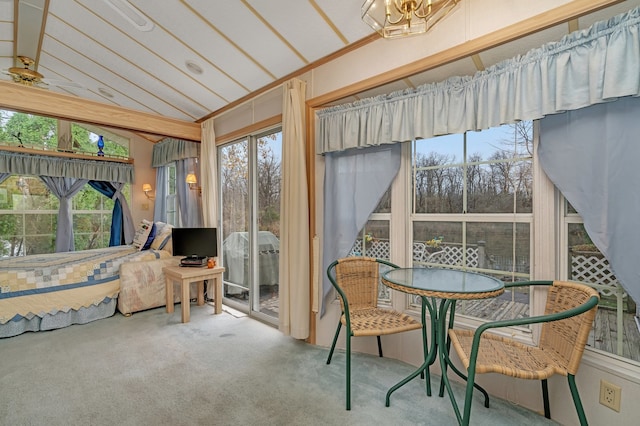 sunroom / solarium with vaulted ceiling and plenty of natural light