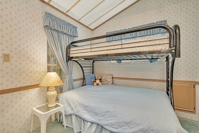 bedroom featuring carpet and lofted ceiling