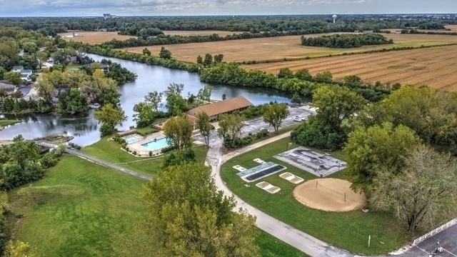 bird's eye view with a rural view and a water view