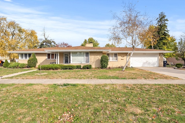 single story home featuring a front yard and a garage