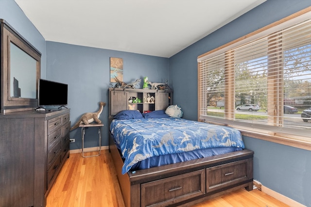 bedroom featuring light wood-type flooring