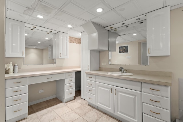 bathroom with vanity and tile patterned flooring