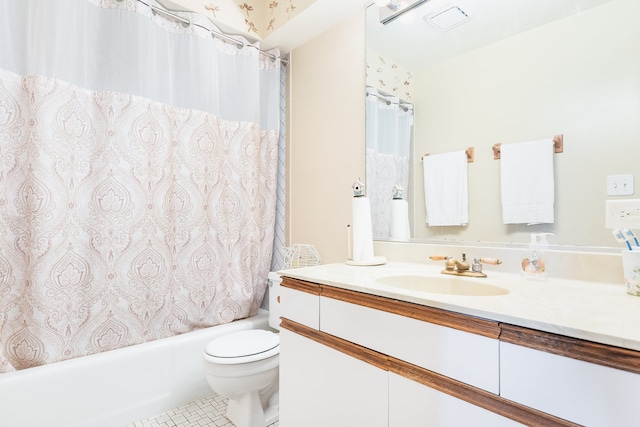 full bathroom featuring vanity, tile patterned flooring, toilet, and shower / tub combo