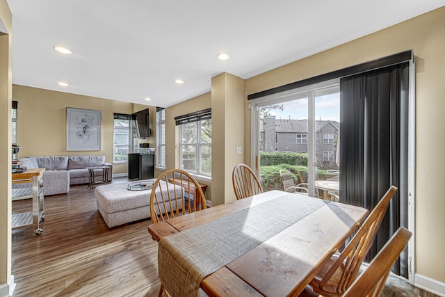 dining area featuring hardwood / wood-style floors