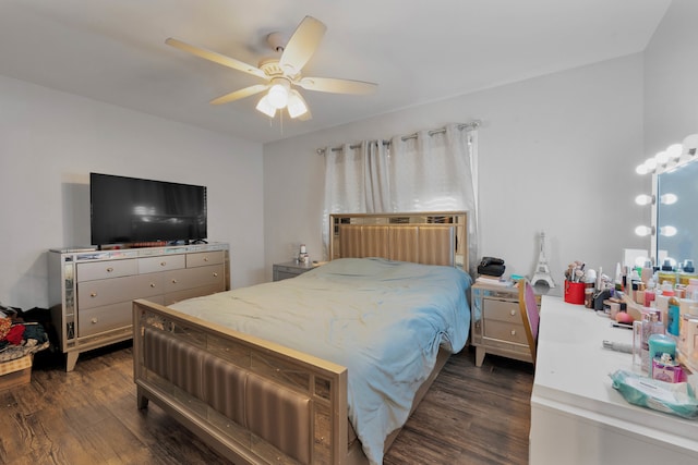 bedroom featuring ceiling fan and dark hardwood / wood-style flooring