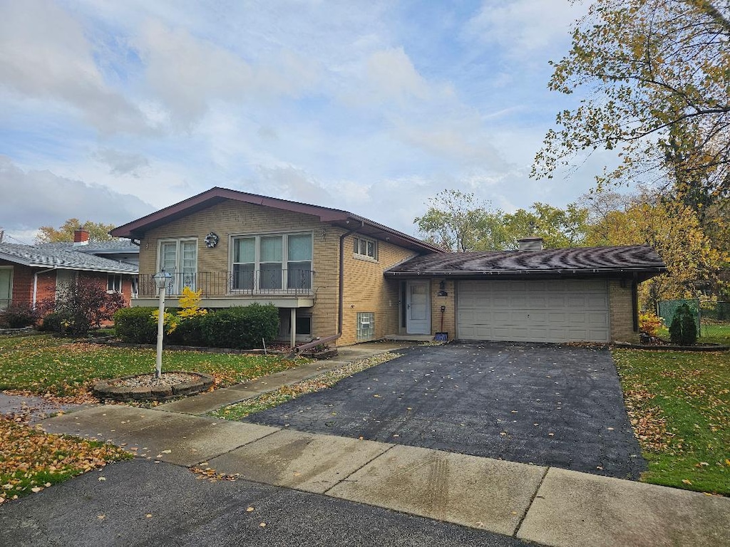 split level home with a garage