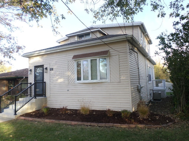 bungalow-style house with central AC