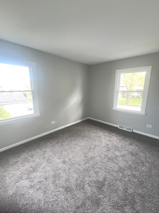 view of carpeted spare room