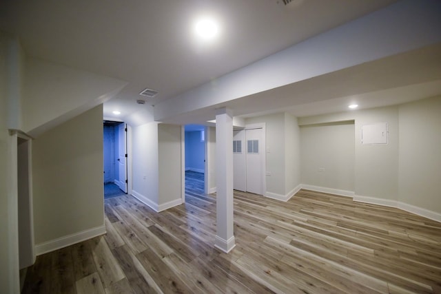 additional living space with light wood-type flooring