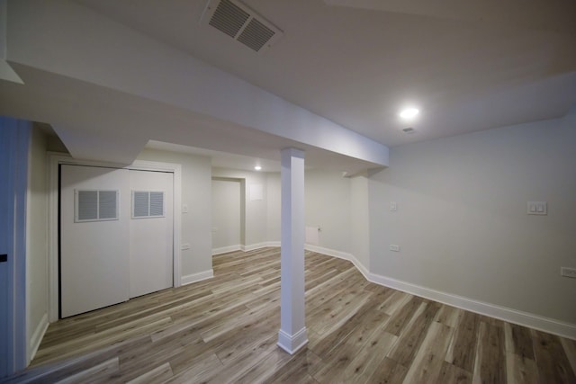 basement with light wood-type flooring