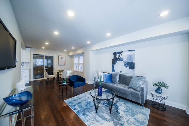 living room featuring dark hardwood / wood-style floors