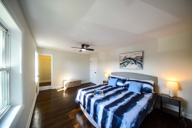 bedroom featuring dark wood-type flooring and ceiling fan