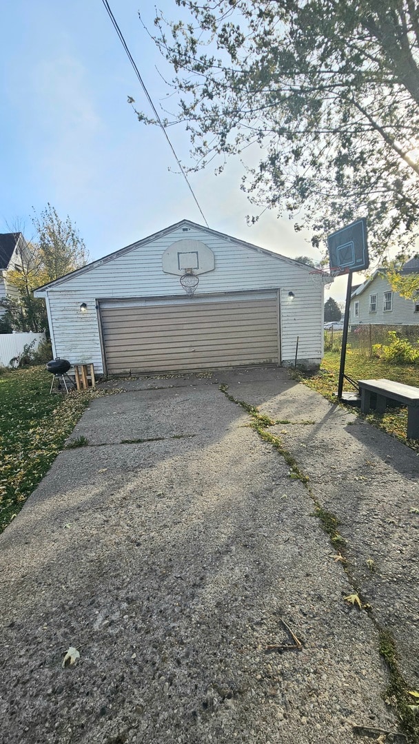 view of outdoor structure with a garage