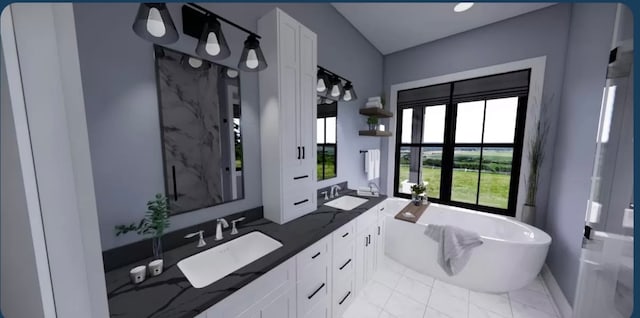 bathroom with vanity and shower with separate bathtub