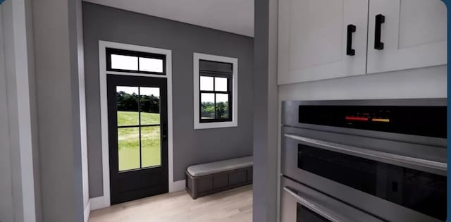 doorway to outside featuring light hardwood / wood-style floors