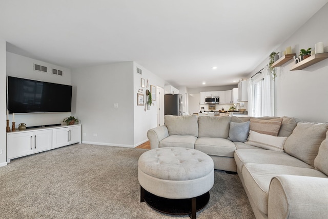 living room featuring carpet