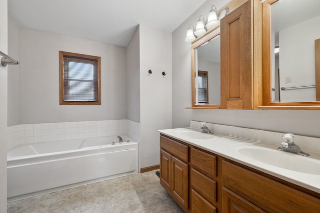 bathroom featuring a bathtub and vanity