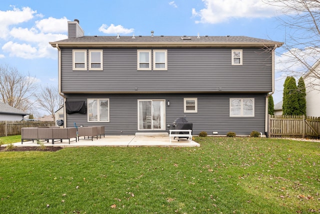 rear view of property featuring an outdoor hangout area, a patio, and a yard