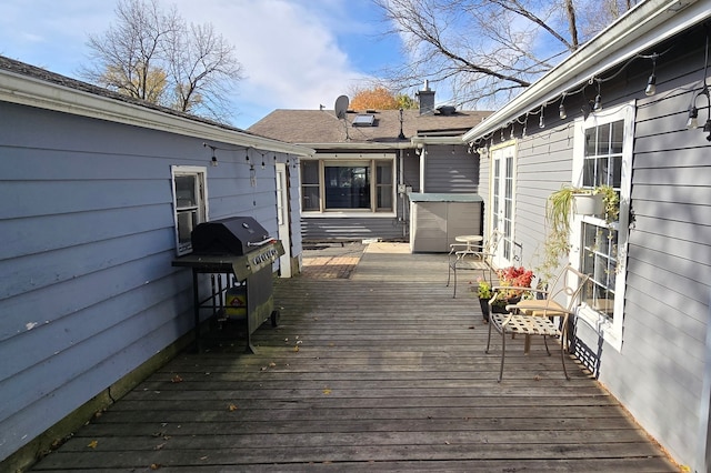 wooden deck with area for grilling