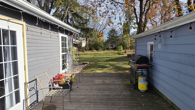 deck featuring a yard